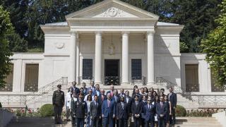 U.S. Members of Congress and students from the American School of Paris attend a wreath ceremony at the Suresnes American Cemetery and Memorial.